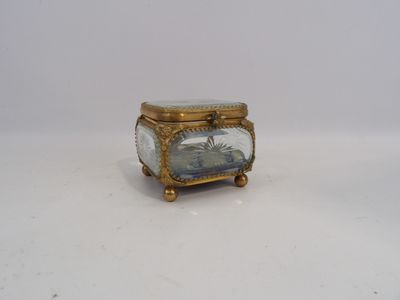 a small box with a picture on it sitting on a table