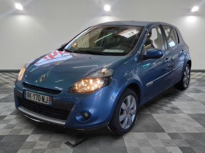 a picture of a small blue car parked in a garage