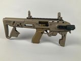 a close up of a toy gun on a white surface