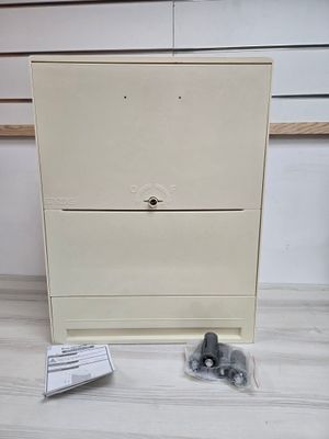 a white cabinet with a door and some screws on it