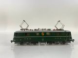 an image of a green train on a white surface