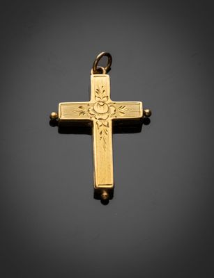 une croix dorée ornée d'un soleil, sur fond noir