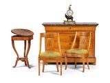 two chairs and a table with a clock on top of it