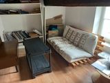 a couch and a table in a small room