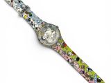 a close up of a wrist watch with cartoon characters on it