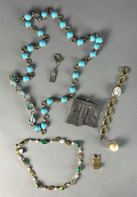 several pieces of jewelry including a necklace, bracelet, and ring