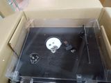 a box that has a small electronic device inside of it