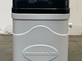 an image of a black and white trash can