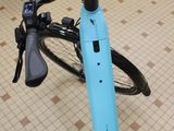 a bicycle that is sitting on the floor in a room