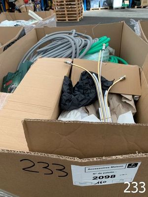 a cardboard box with a bunch of items inside of it
