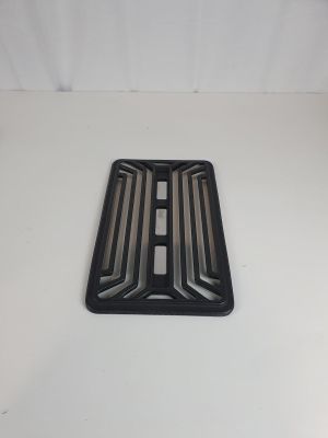 un plateau en plastique noir posé sur une surface blanche