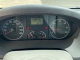 a close up of a car dashboard with a speedometer
