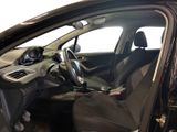 the interior of a car with the door open and the driver ' s seat up