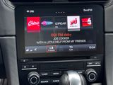 a picture of a car dashboard with a radio in it