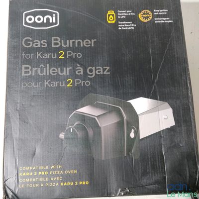 la boîte est ouverte pour montrer le contenu d'un brûleur à gaz