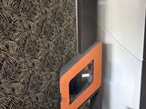 two speakers that are sitting next to each other on the floor