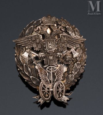 an image of a metal badge with an eagle on top of it