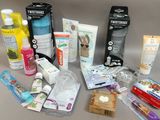 many different types of toothbrushes and toothpaste on the table