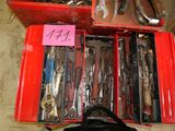 many tools in a red box on the floor