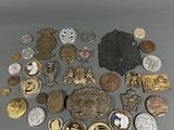 some of the medals and medals are on display on the table
