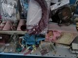 many different items on the shelf in the store