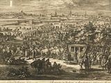 framed picture of a view of a city with a lot of people in it
