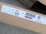a box with a barcode on it sitting on the floor