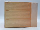 the box is open on a white surface with a white background