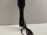 a hair dryer that is sitting on a table