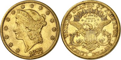 a gold coin with the head of a woman and eagle on it