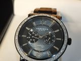 the watch is in the box with the box open
