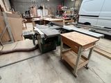 a picture of a workbench in a workshop with a lot of tools