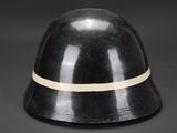 a black helmet with a white stripe on the side