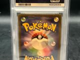 a close up of a pokemon card in a clear case