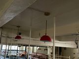 a large room with a lot of tables and chairs