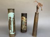 three vases that are sitting next to each other on a table