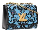 the louis vu bag is decorated with blue and black flowers