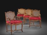 lot de quatre chaises à dossier en rotin de style Louis II