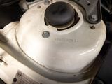 a close up of a motorcycle engine with a gas tank