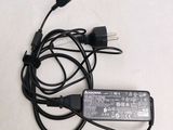 a charger that is plugged into a laptop charger