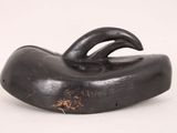 an image of a black sculpture of a bird on a white background