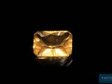 a yellow diamond on a black background