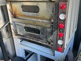 a large oven sitting on top of a table