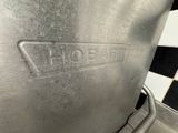 a close up of a metal pan with a handle on it