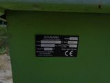 a close up of a sign on a green box