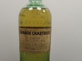 a close up of a bottle of liquor on a table
