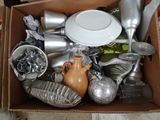 a box full of silver and silver items in it