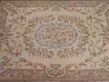 an image of a rug with a floral design on it