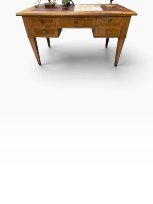 a wooden desk with two vases on top of it