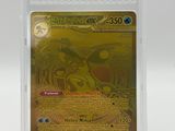 a close up of a pokemon card in a plastic case